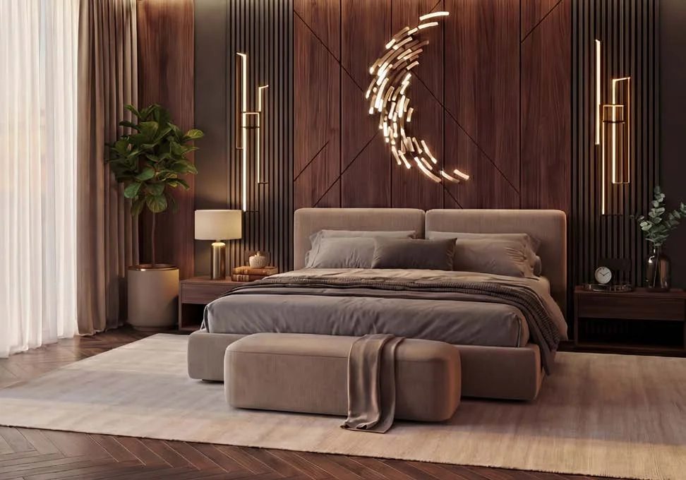 Спальня резиденции AURUS Residences в тёплых тонах с настенным светильником